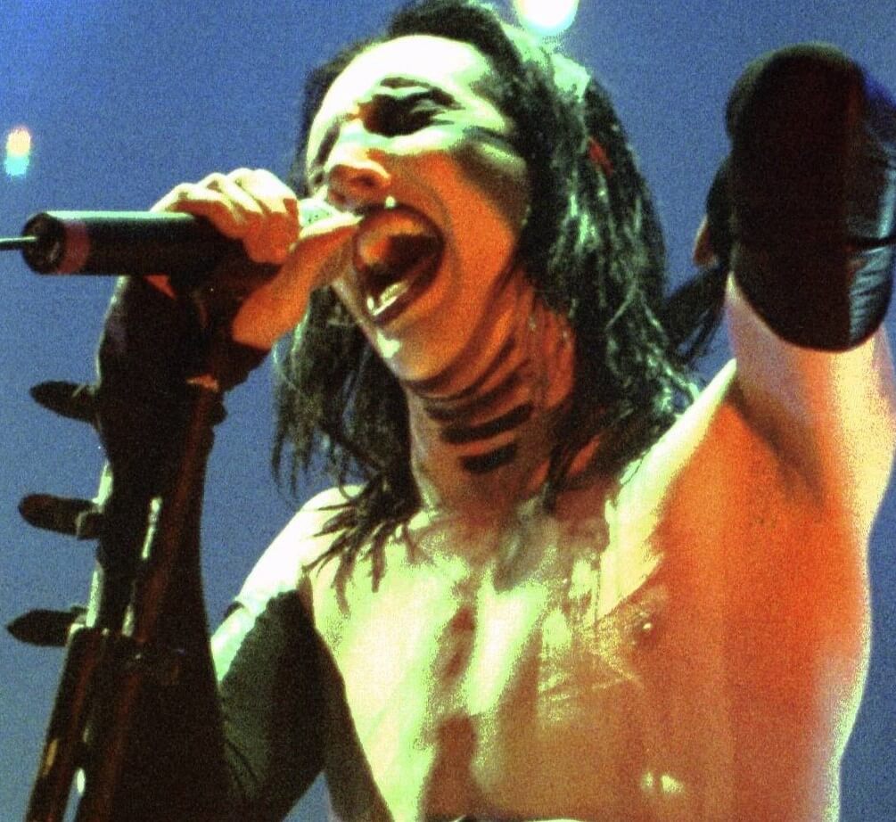 Satanist Marilyn Manson with a microphone