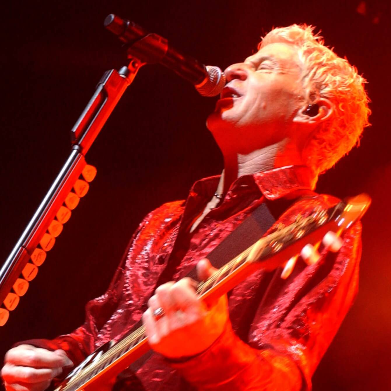 REO Speedwagon's Kevin Cronin with red light