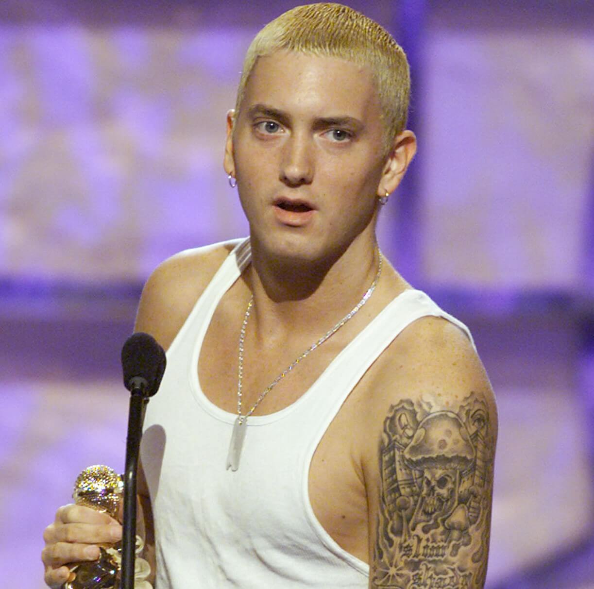Eminem, known for his Slim Shady persona, with yellow hair