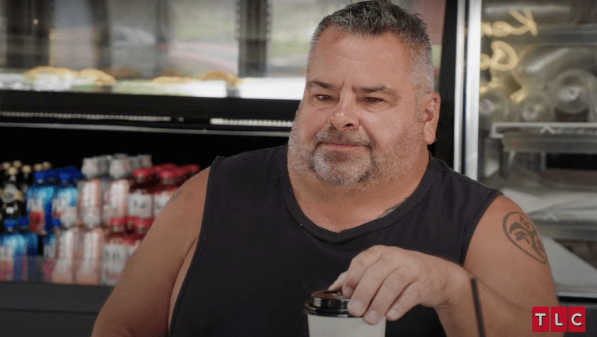 Big Ed Brown from '90 Day Fiancé' wearing a black tank top