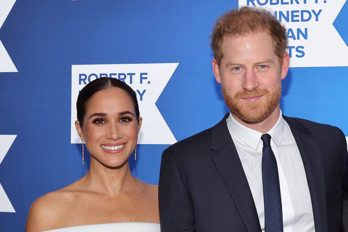 Meghan Markle and Prince Harry, who have made comments about daughter Princess Lilibet, pose on a red carpet during a 2022 gala
