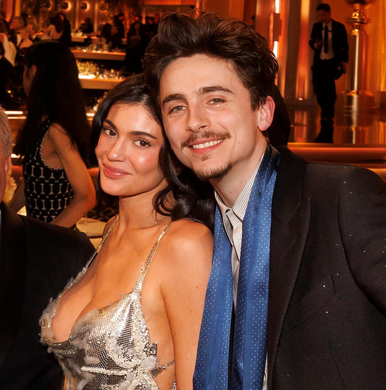 Kylie Jenner and Timothée Chalamet posing and smiling together at the Golden Globes in 2025