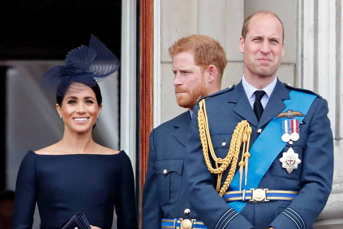 Prince William, who is 'seething' after Meghan Markle wore a Northwestern sweatshirt like Princess Diana's on Instagram, with Meghan Markle and Prince Harry