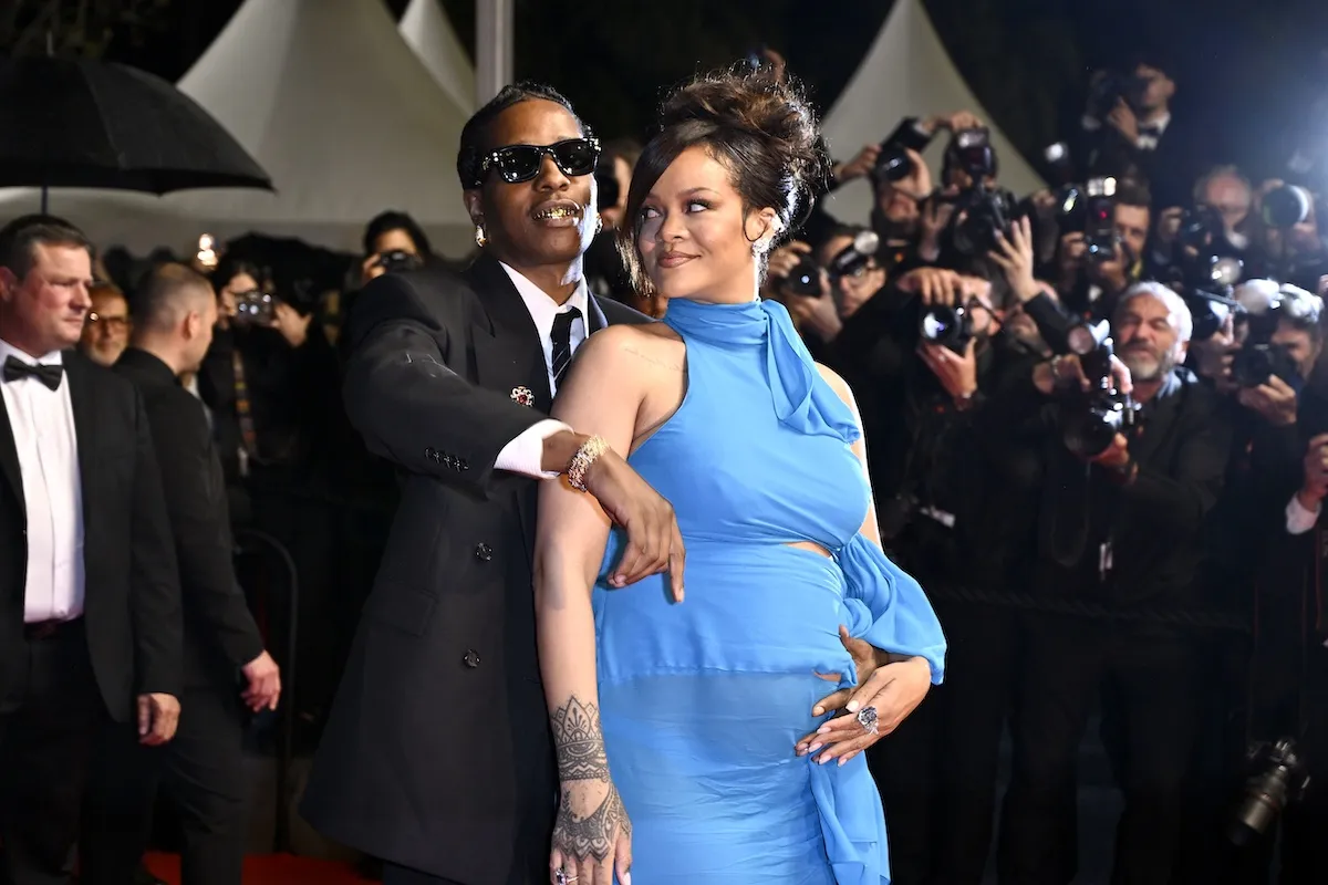 Glowing Rihanna Shows Off Baby Bump as She Gets Cozy With AAP Rocky in(02)