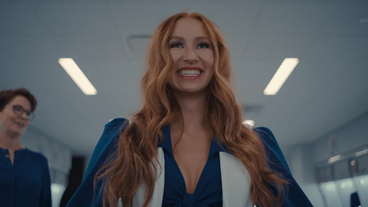Smiling Charly in Season 1 of 'America's Sweethearts: Dallas Cowboys Cheerleaders'