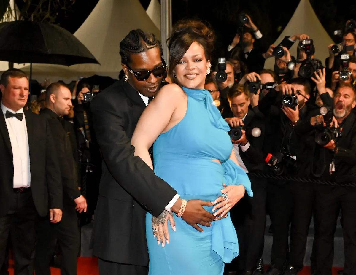 A$AP Rocky cradling Rihanna's baby bump