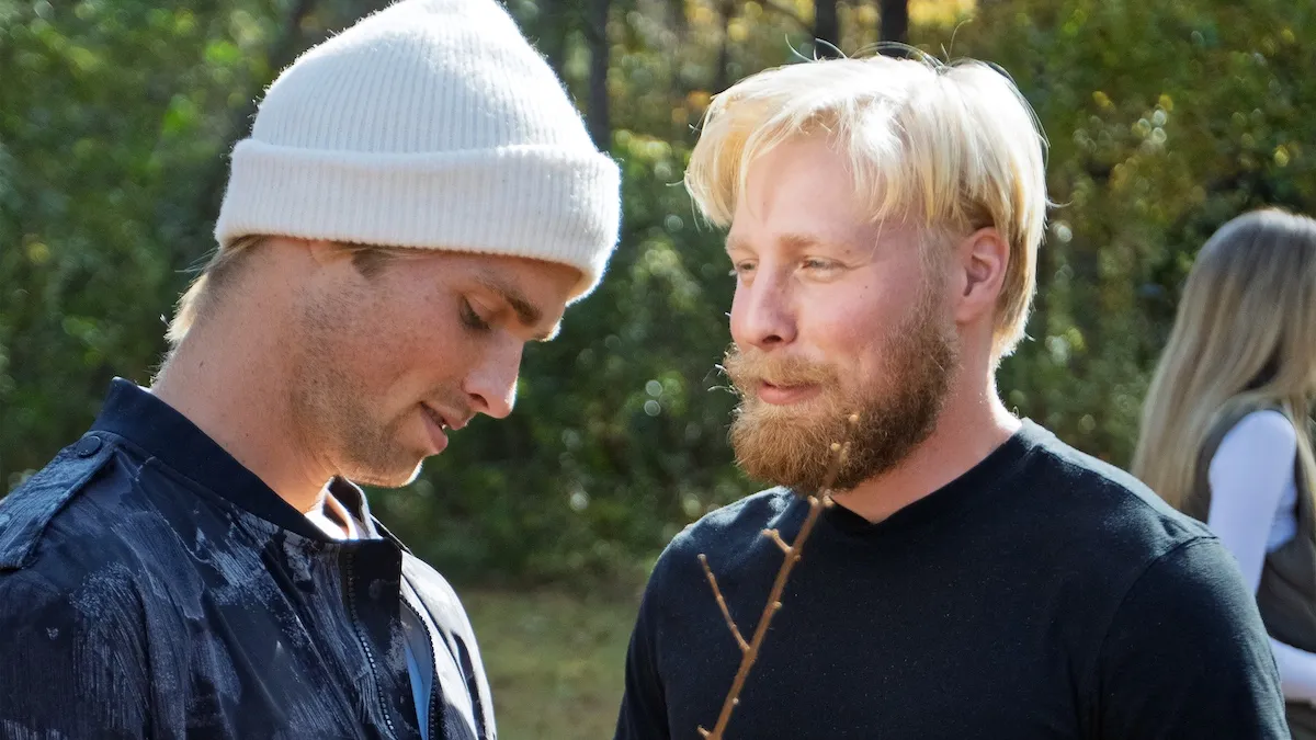 Micah Plath, wearing a white beanie, talking to Ethan Plath in 'Welcome to Plathville' Season 7