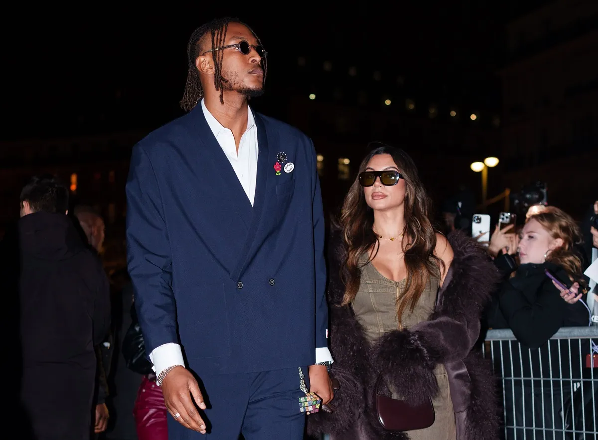 Miles Turner and his girlfriend, Aysia Janelle, outside the Kenzo Menswear Fall-Winter 2025-2026 show as part of Paris Fashion Week