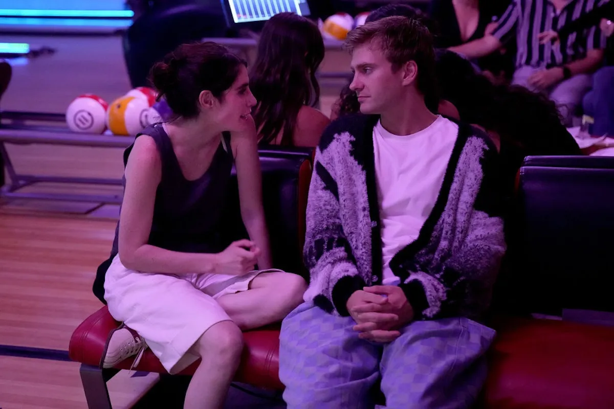 'Next Gen NYC' cast members Georgia and Charlie talking in a bowling alley