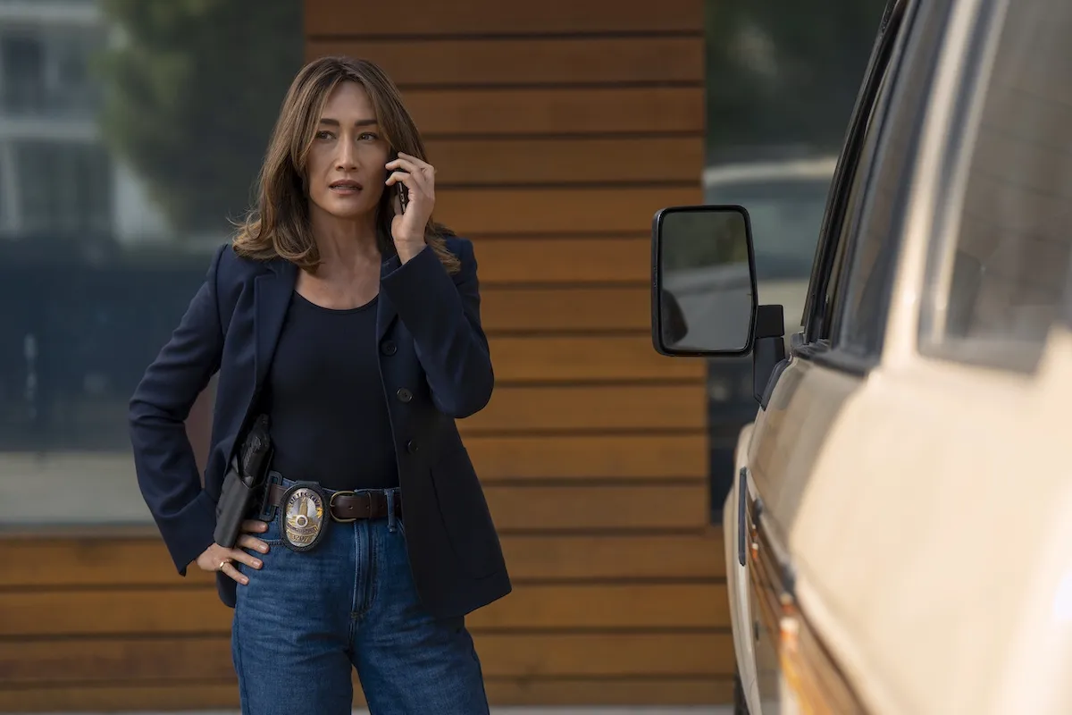Maggie Q in a black shirt and jacket in 'Ballard'