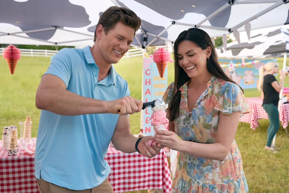 Man and woman holding an ice cream cone