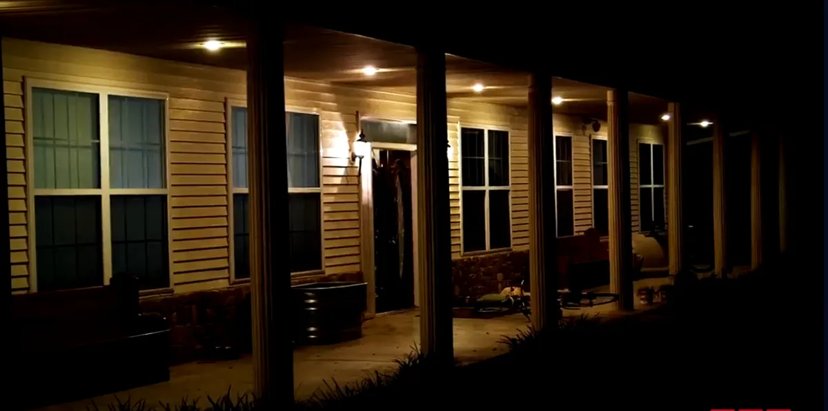 The outside of the Duggar home at night