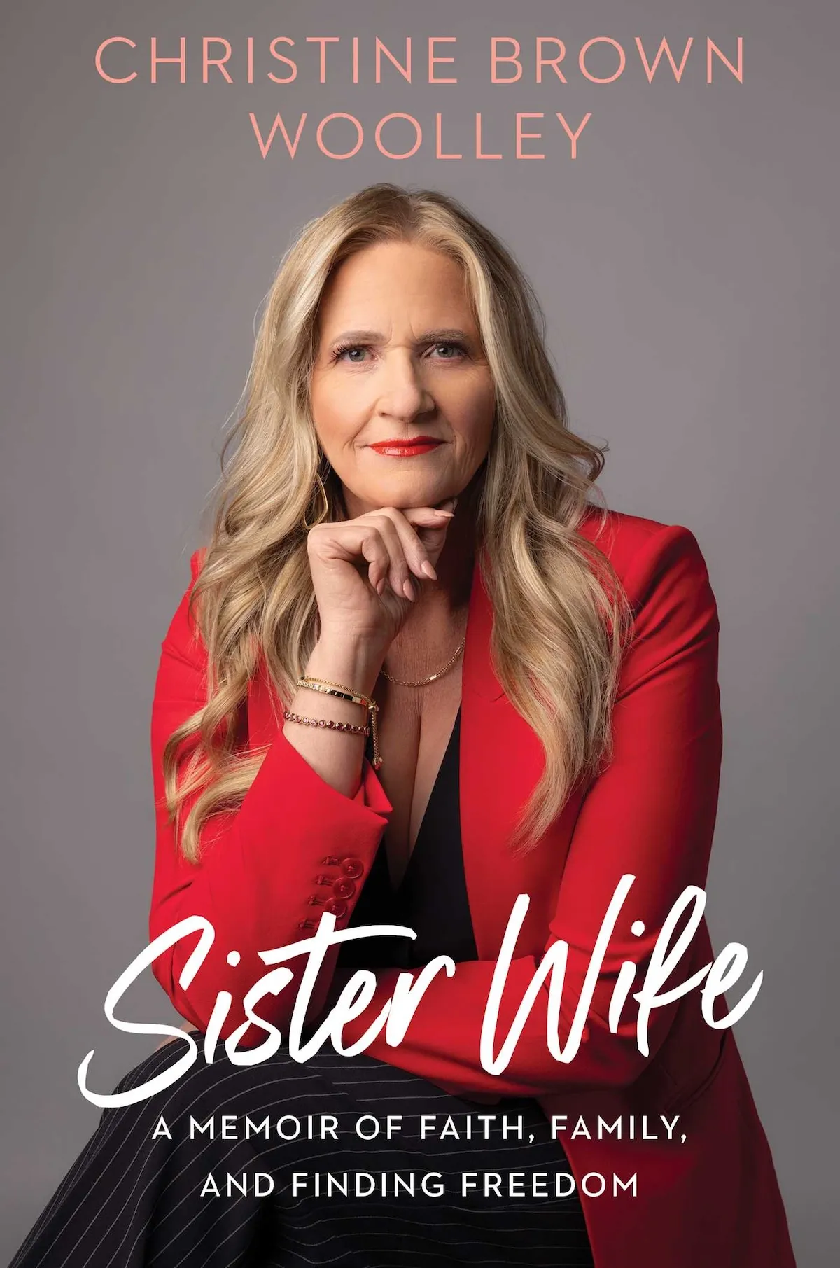 Cover of Christine Brown's book 'Sister Wive' with her wearing a red jacket