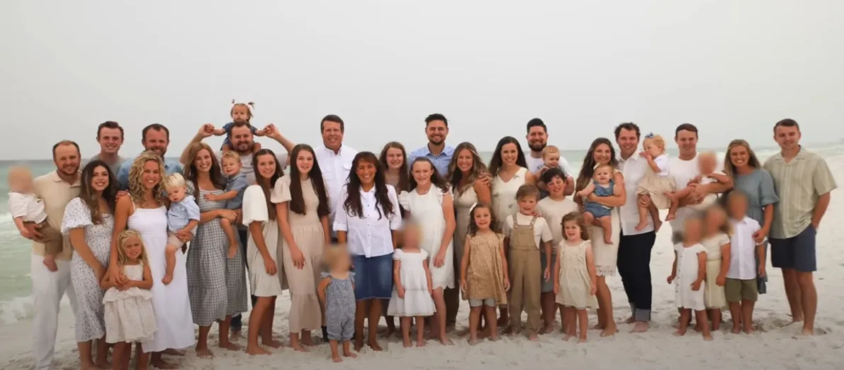 The Duggar family poses together while on a family vacation