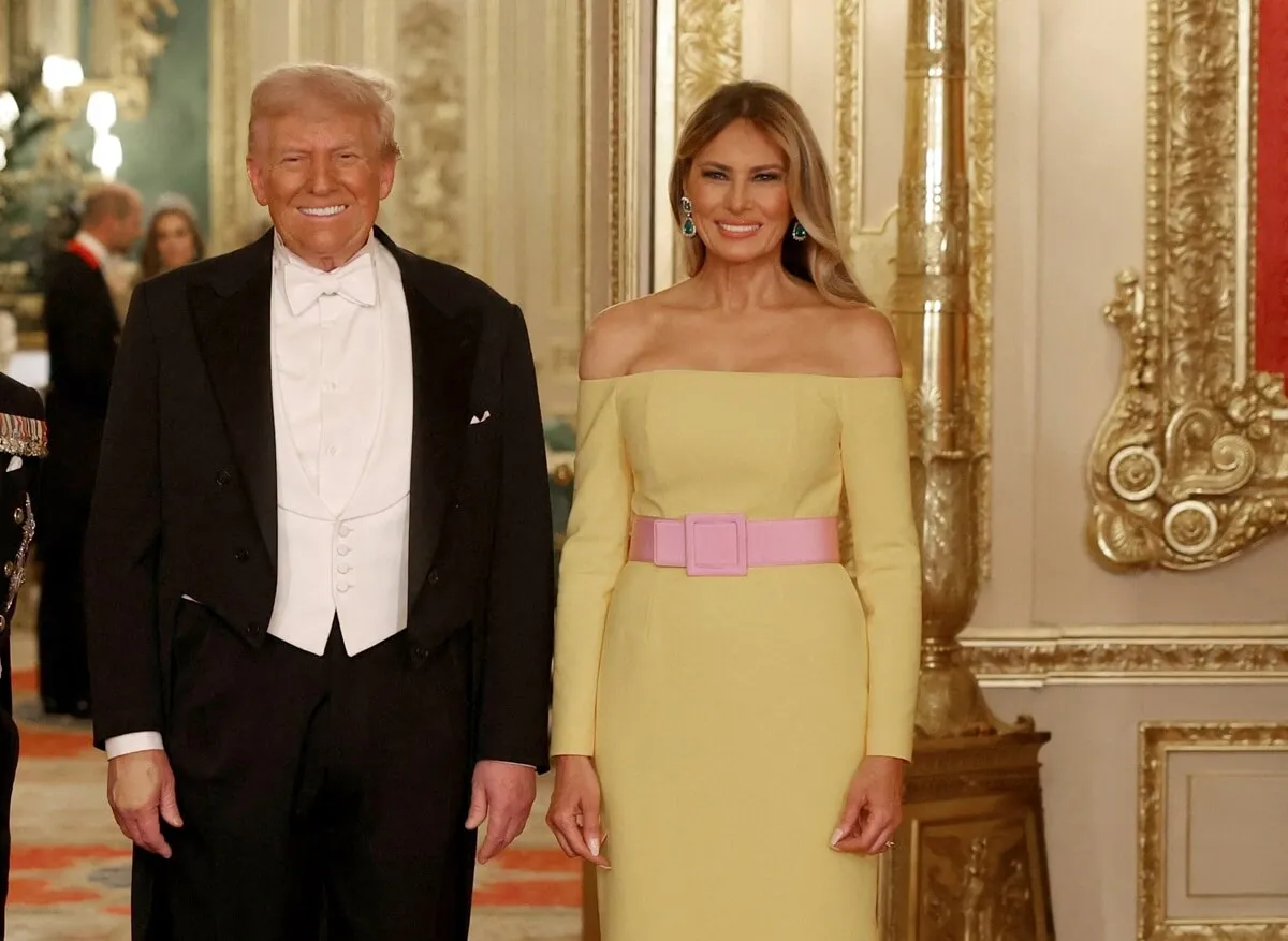 U.S. President Donald Trump and First Lady Melania Trump pose for a photo at the State Banquet at Windsor Castle during the State visit