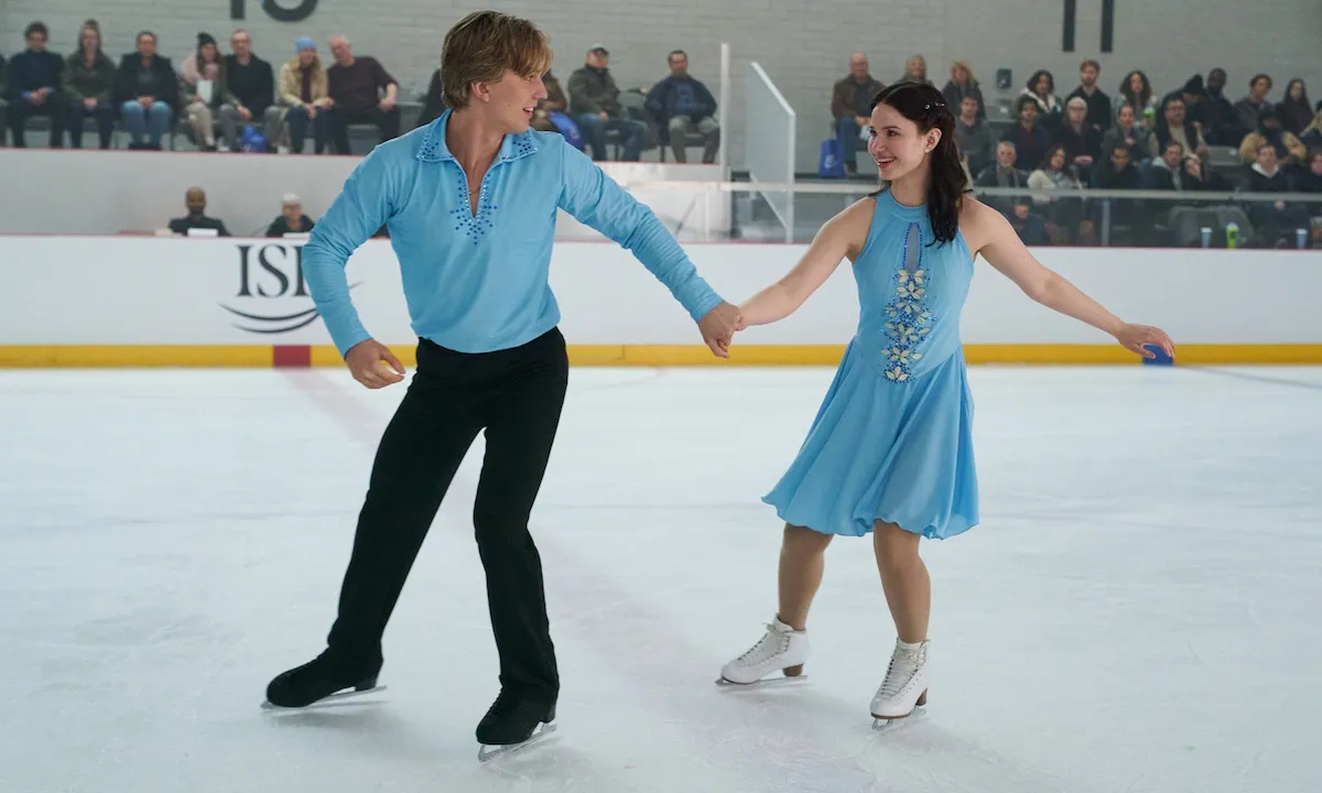 Young man and woman ice skating in Netflix series 'Finding Her Edge'