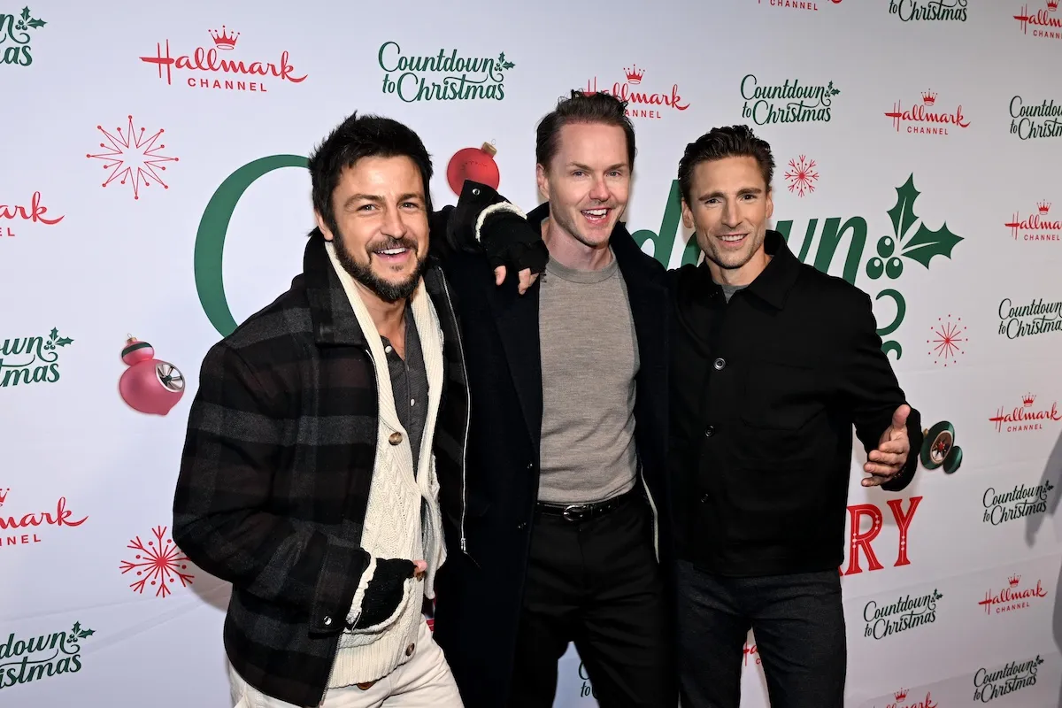 Tyler Hynes, Paul Campbell, and Andrew Walker pose for a photo at Hallmark's Countdown to Christmas event