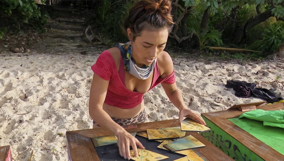 Savannah Louie works on a challenge in the 'Survivor' 49 season finale