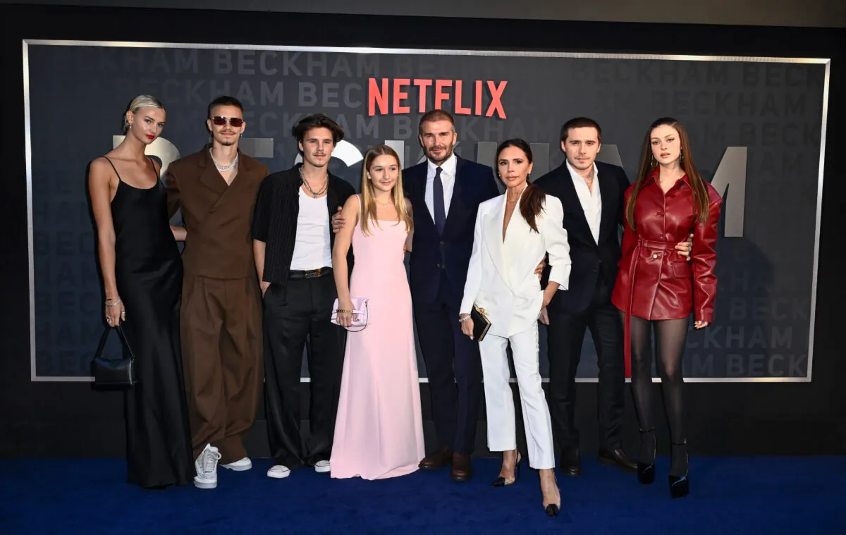 Mia Regan, Romeo Beckham, Cruz Beckham, Harper Beckham, David Beckham, Victoria Beckham, Brooklyn Peltz Beckham and Nicola Peltz Beckham stand together.