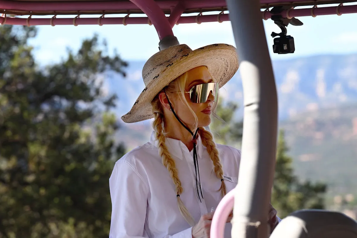 Erika Jayne of 'RHOBH' wearing a hat and sunglasses