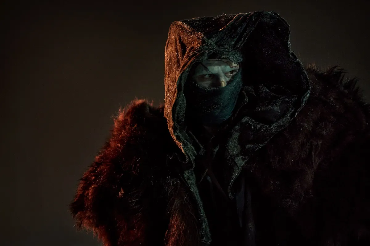 Jacob Elordi as the Creature, wearing a hood, in 'Frankenstein'