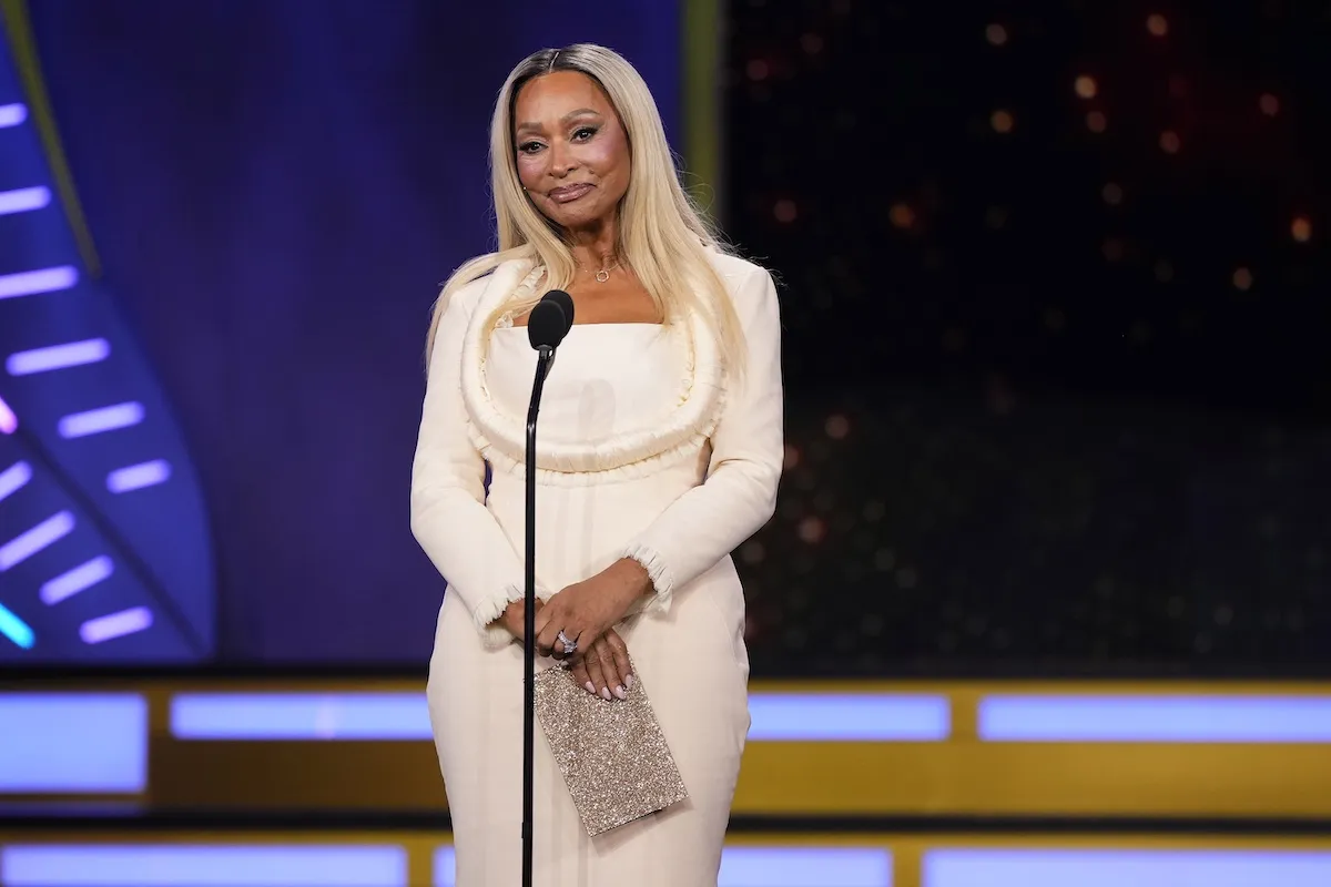 Karen Huger in a white dress at BravoCon 2025