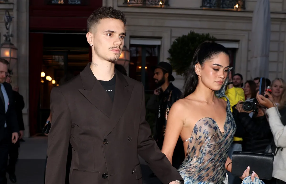 Romeo Beckham and Kim Turnbull are seen during Paris Fashion Week