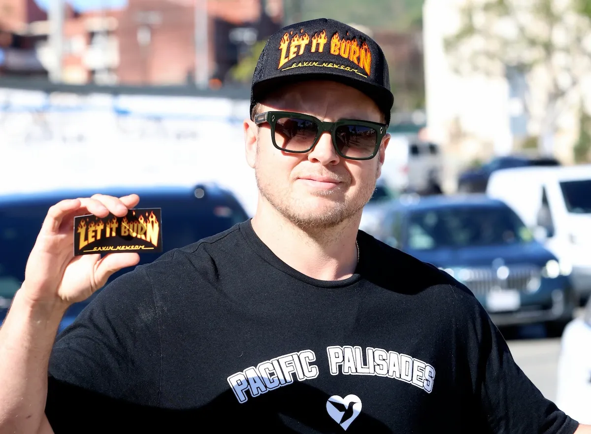 Spencer Pratt wearing a 'let it burn' hat