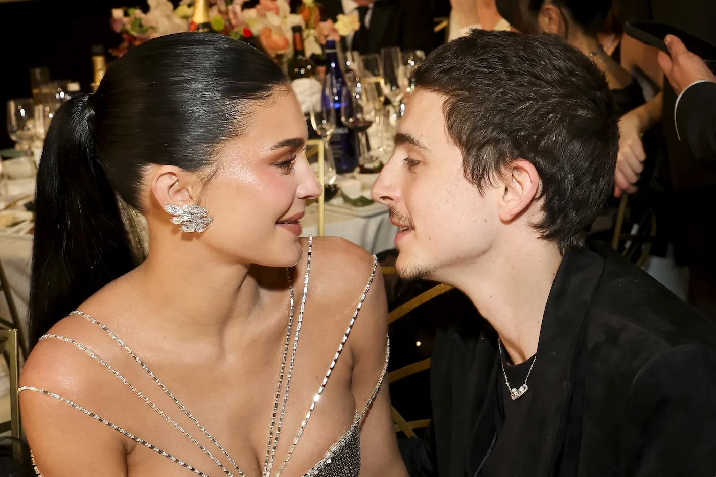 Kylie Jenner and Timothée Chalamet looking at each other lovingly at the 2026 Golden Globes