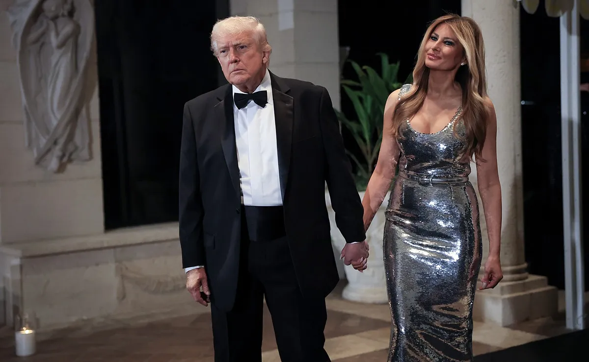 U.S. President Donald Trump and first lady Melania Trump arrive for a New Year’s Eve event at Mar-a-Lago home