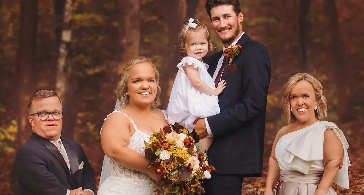Liz Johnston and Brice Bolden of '7 Little Johnstons' on their wedding day with their daughter and her parents