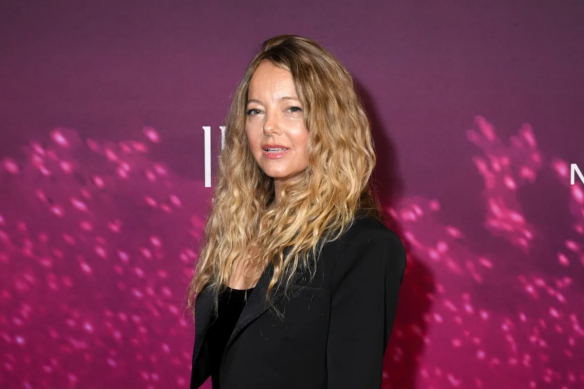 Bijou Phillips against a purple backgorund