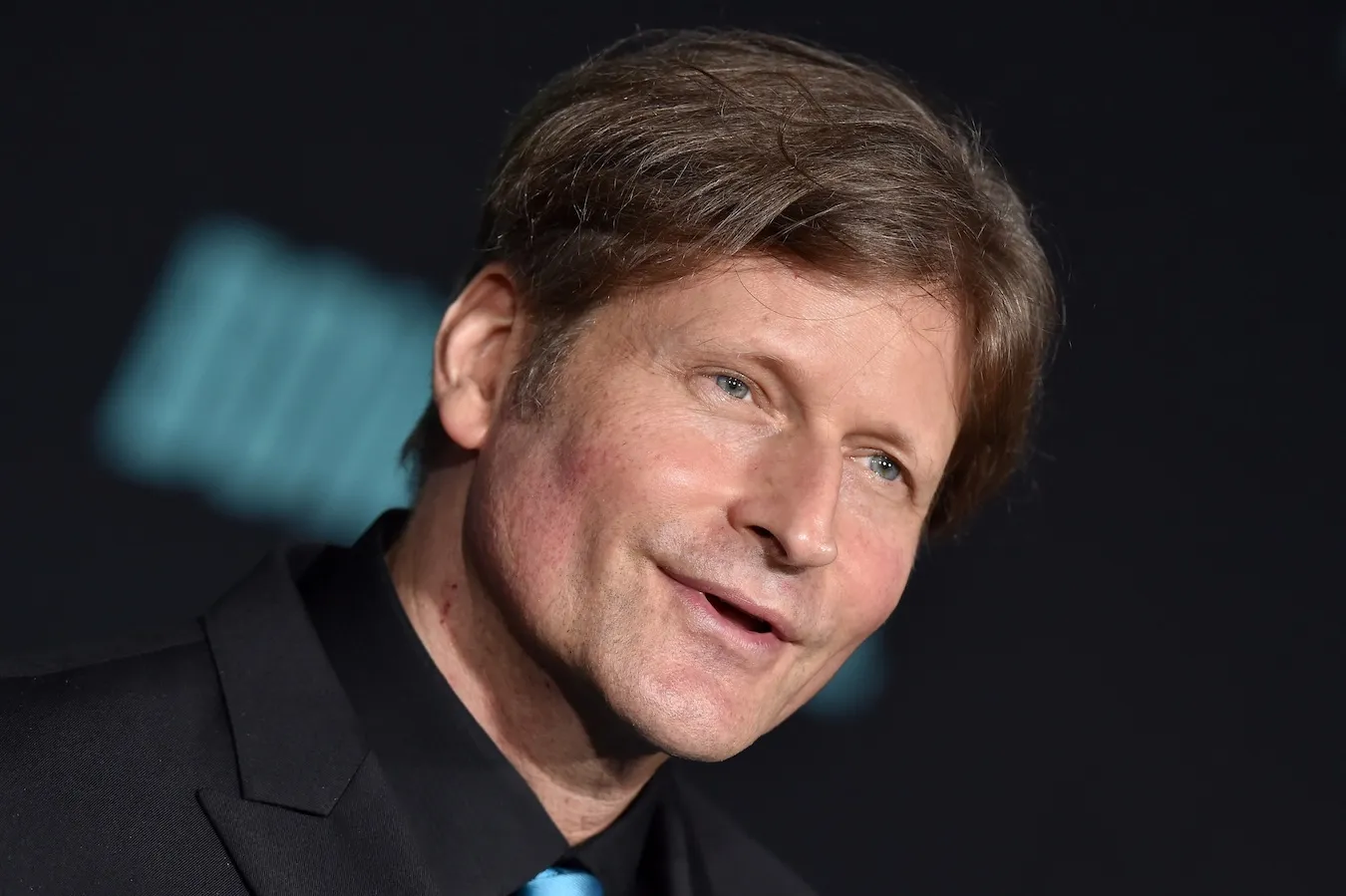 A close-up and diagonal angle of Crispin Glover's face in 2019