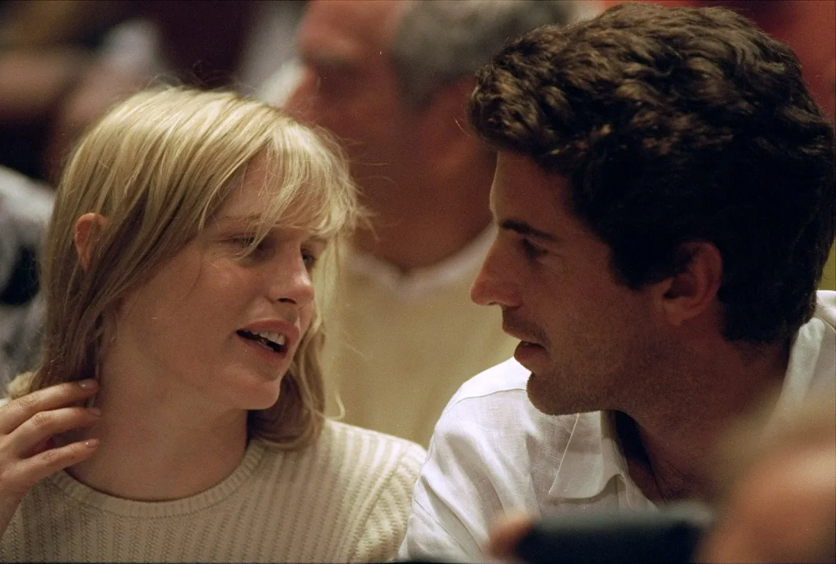 John F. Kennedy Jr. and Darryl Hannah watch game between the New York Knicks and the Houston Rockets at Madison Square Garden