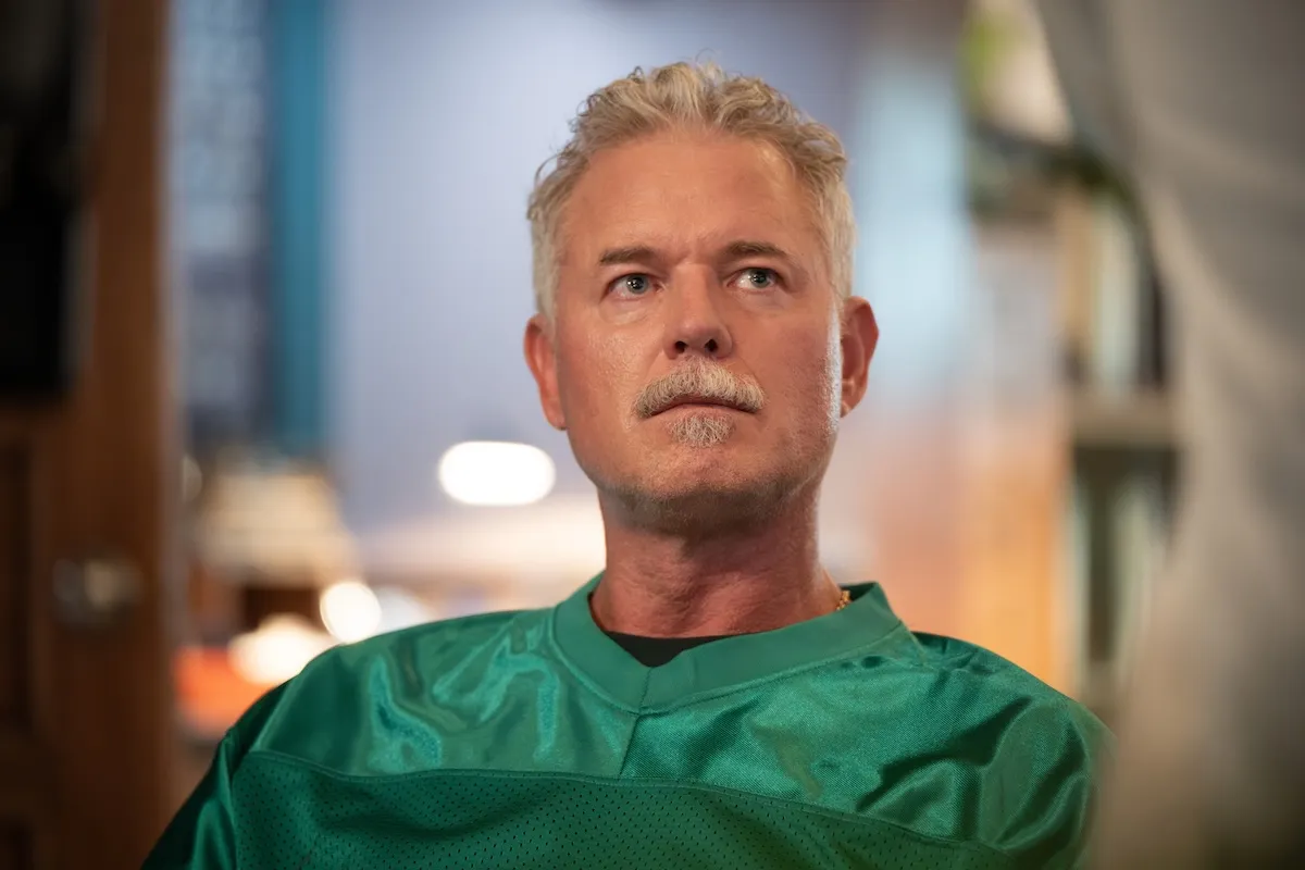 Eric Dane sitting and looking upward in 'Brilliant Minds.'