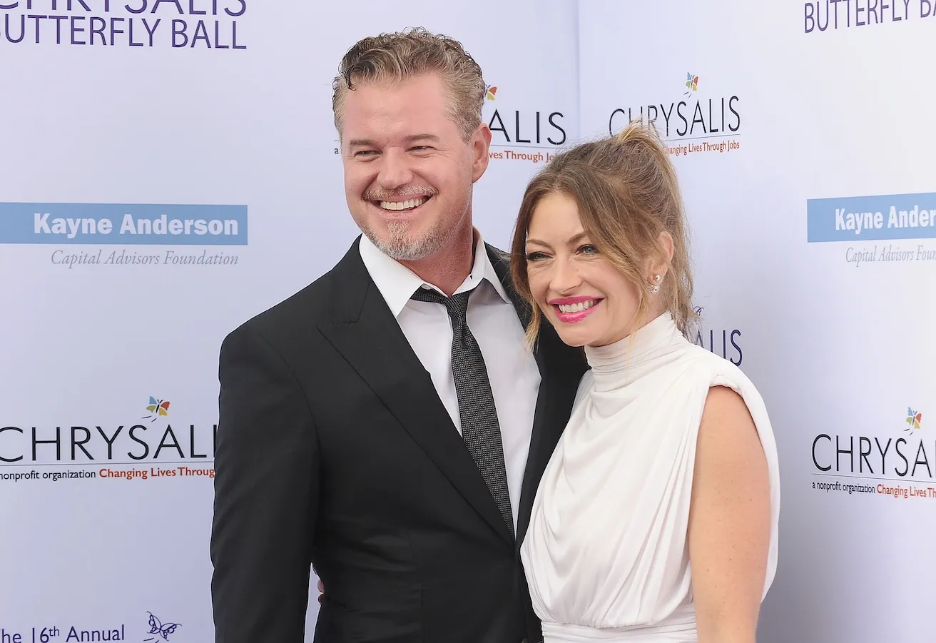 Eric Dane and Rebecca Gayheart smiling and posing together at an event in 2017