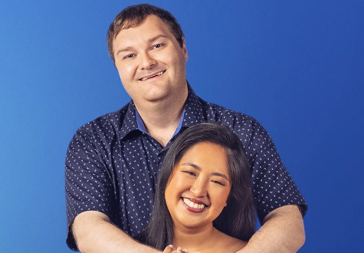 Forrest from '90 Day Fiance: Before the 90 Days' with his arms around Sheena against a blue background