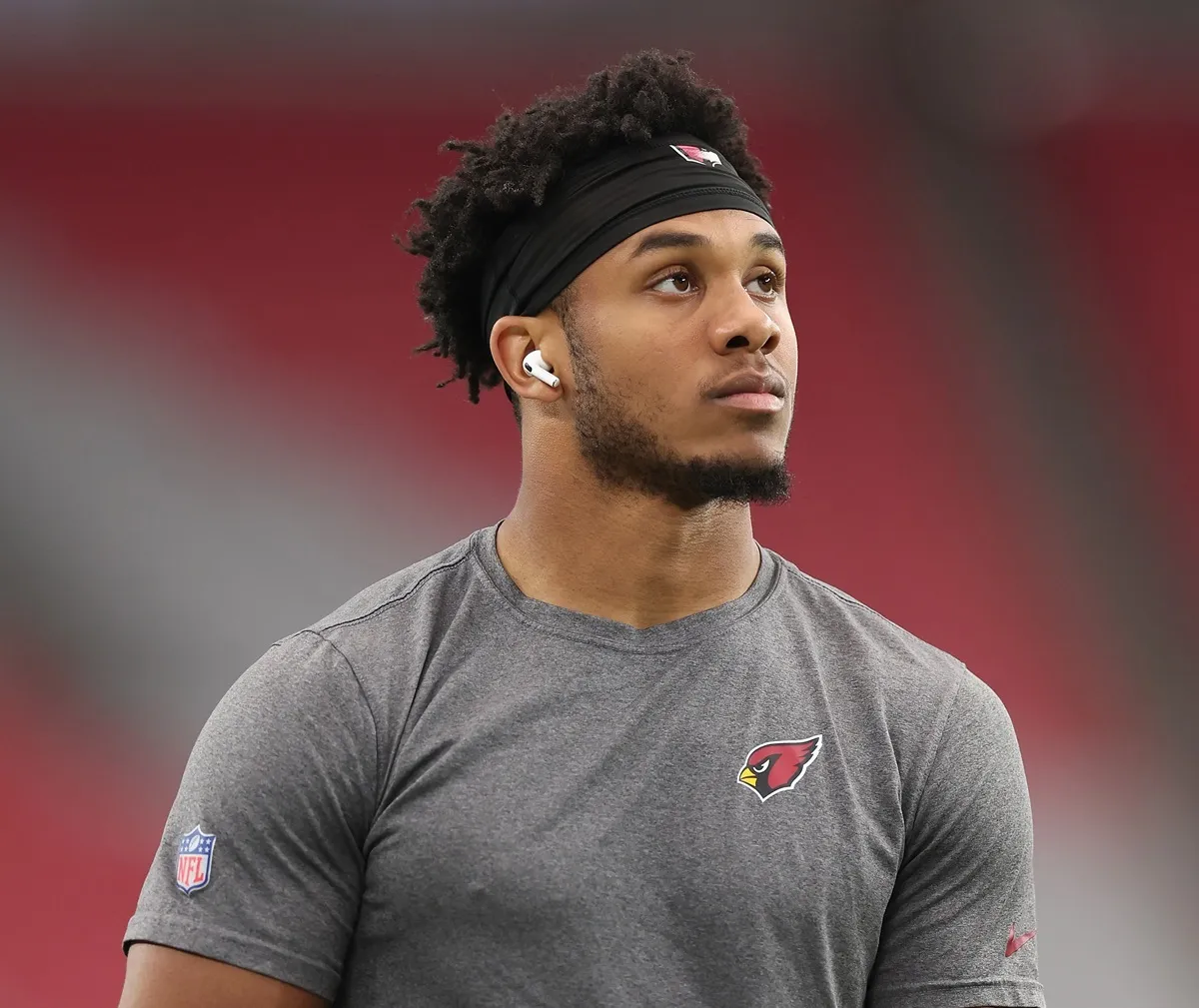 Rondale Moore #4 of the Arizona Cardinals warms up before the NFL game against the Los Angeles Rams at State Farm Stadium on November 26, 2023