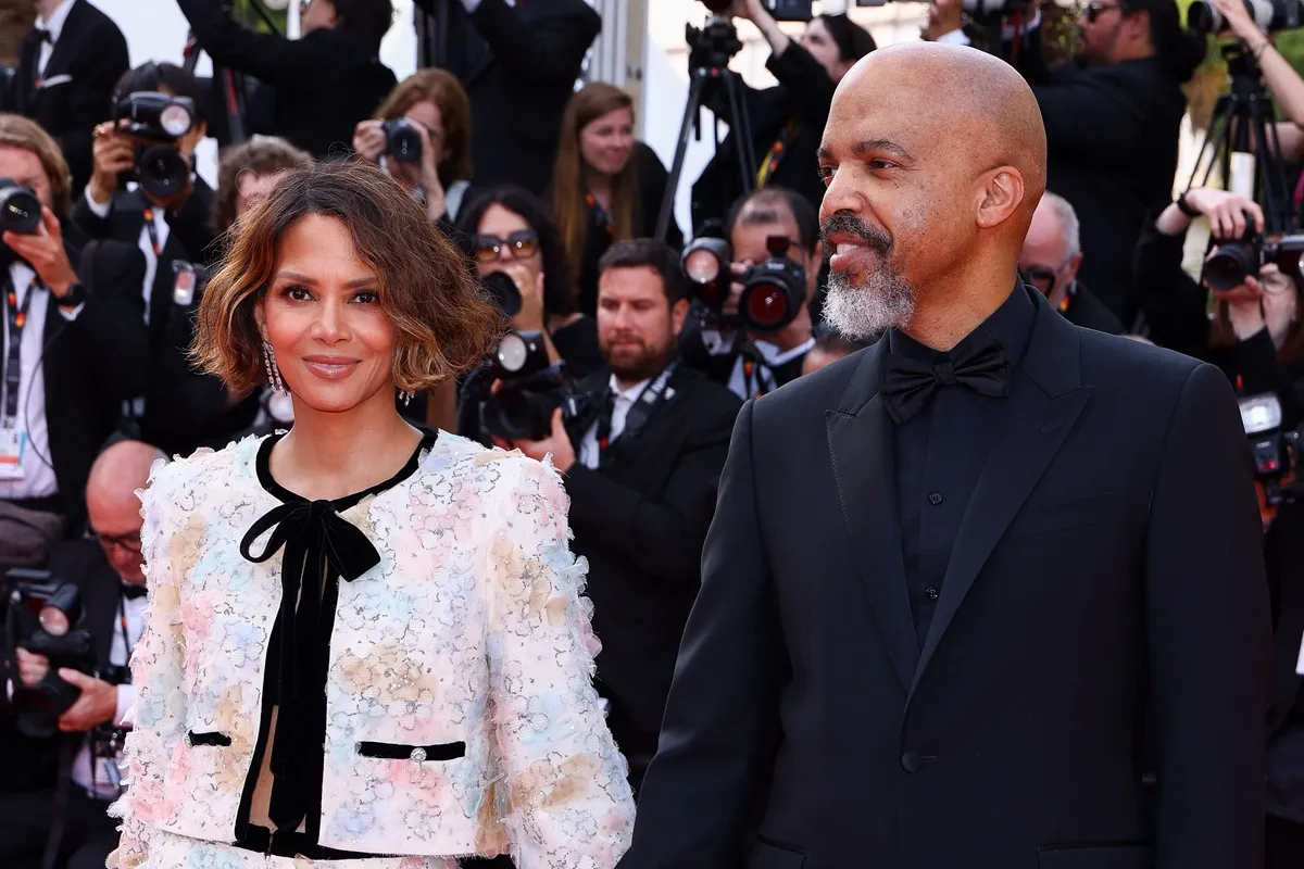 Halle Berry and Van Hunt attend the "The Phoenician Scheme" red carpet at the 78th annual Cannes Film Festival at Palais des Festivals on May 18, 2025 in Cannes, France.