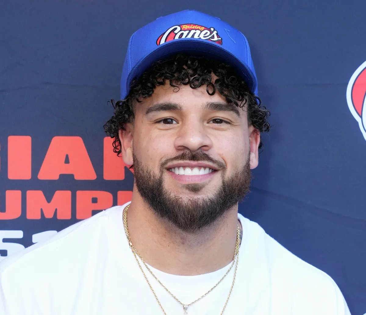 Cory Wharton attends Raising Cane's unveiling of a giant jack-o'-lantern with Todd Graves and celebrity friends at Hollywood & Highland in Los Angeles, California.