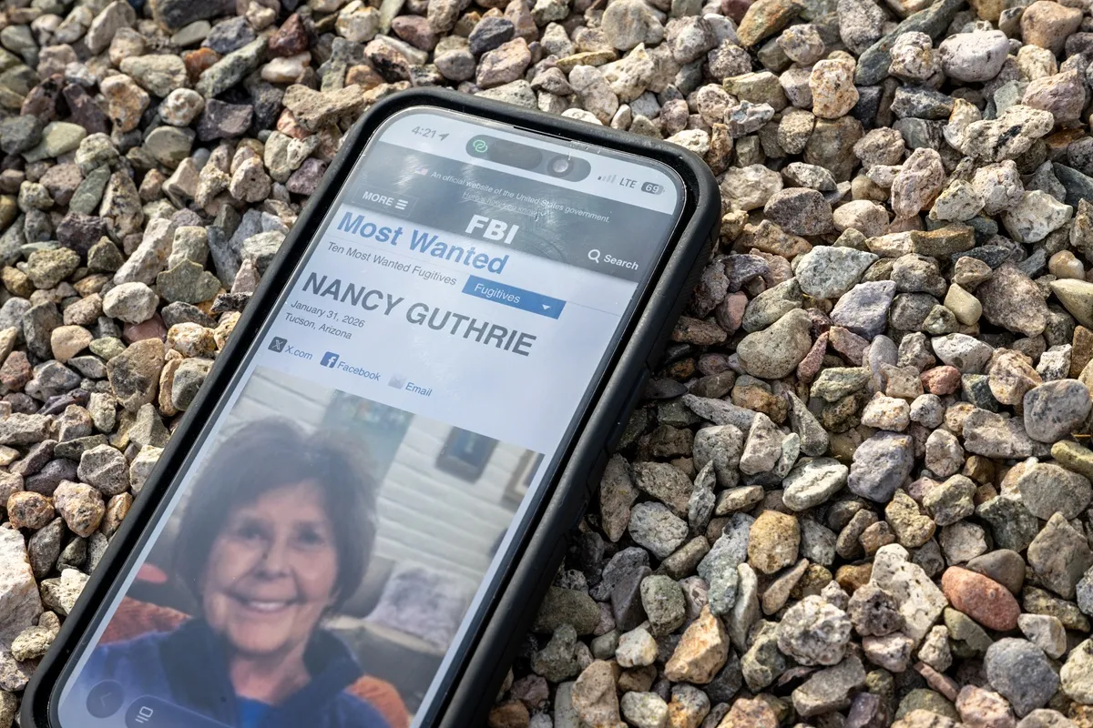 Nancy Guthrie is seen on the FBI website on a cellular phone February 10, 2026 in Tucson, Arizona. Searches continues for Nancy Guthrie, the 84-year-old mother of U.S. journalist and television host Savannah Guthrie, after she went missing from her home on the morning of February 1st. Guthrie's possible abductors had set a deadline of 5pm on February 9 for a $6 million payment