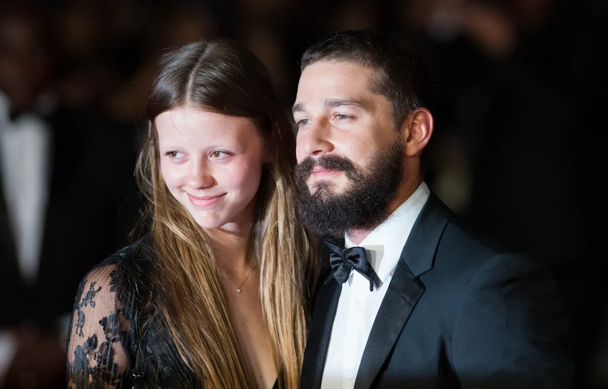 Shia LaBeouf (R) and Mia Goth posing together at a screening for 'Fury'