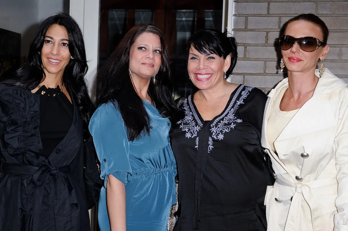 Original 'Mob Wives' cast members Carla Facciolo, Karen Gravano, Renee Graziano, and Drita D'avanzo pose for a photo in 2011
