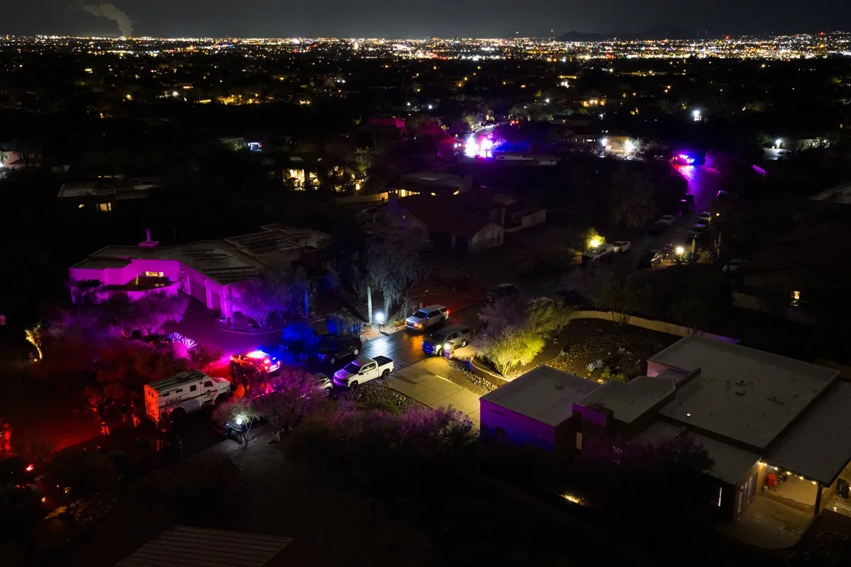 In an aerial view, FBI and SWAT units perform operations in a neighborhood approximately two miles from Nancy Guthrie's residence on February 13, 2026 in Tucson, Arizona