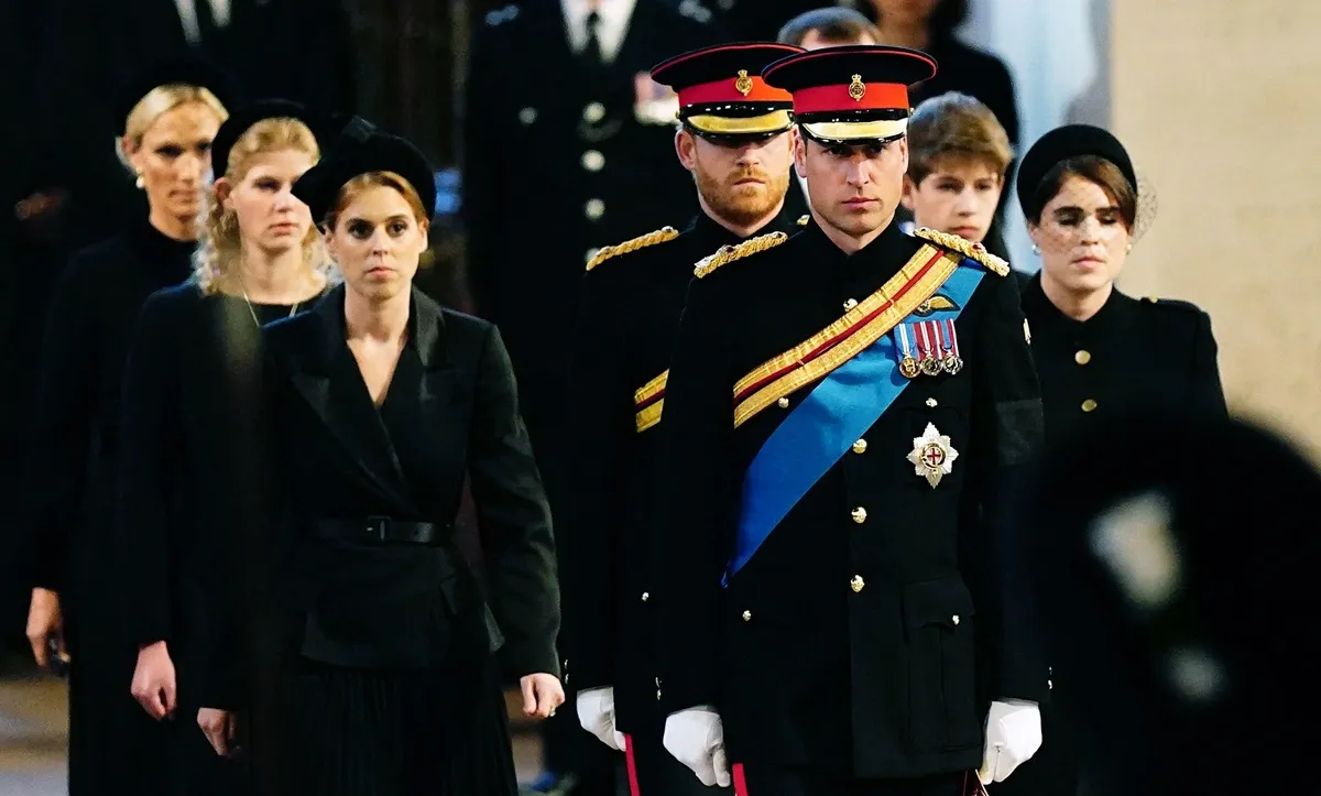 Prince William along with Prince Harry and their cousins arrive to hold a vigil at the coffin of Queen Elizabeth II, lying in state on the catafalque in Westminster Hall