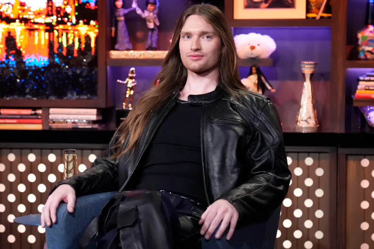 'Vanderpump Rules' star Venus Binkley wears black and sits in an arm chair.