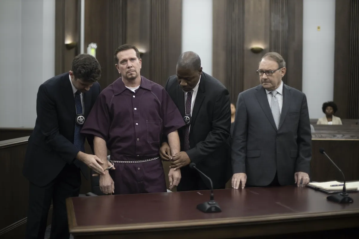 Actor Bobby J Brown in handcuffs in an episode of HBO's 'We Own This City'