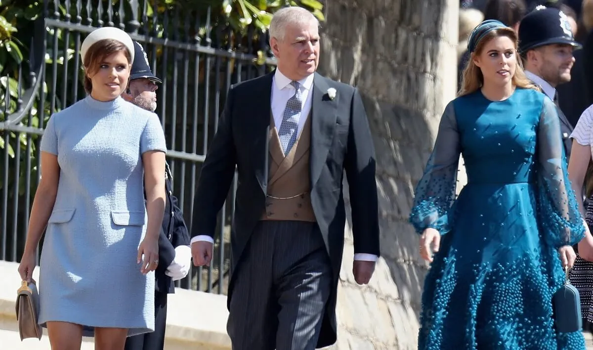 Andrew Mountbatten-Windsor, Princess Eugenie, and Princess Beatrice arrive for the wedding ceremony of Prince Harry and Meghan Markle