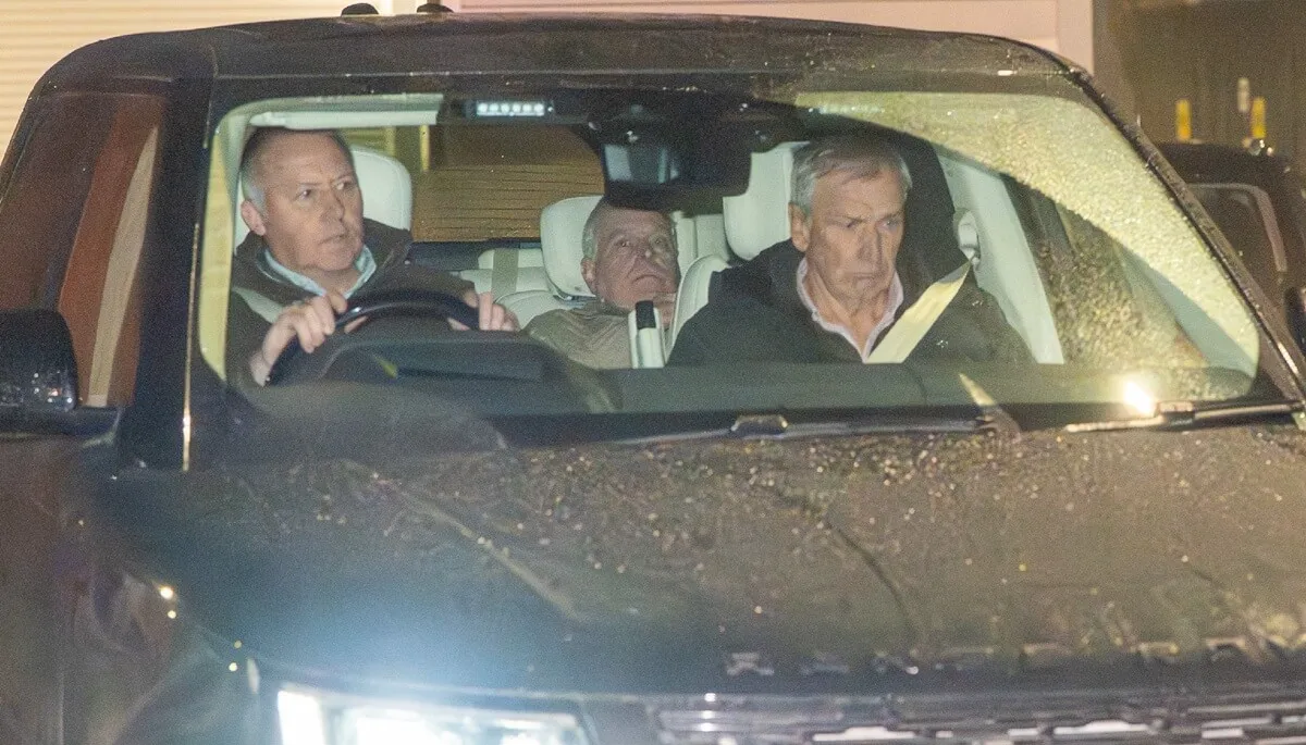 Andrew Mountbatten-Windsor is seen being driven away from a police station following his arrest on suspicion of misconduct in a public office