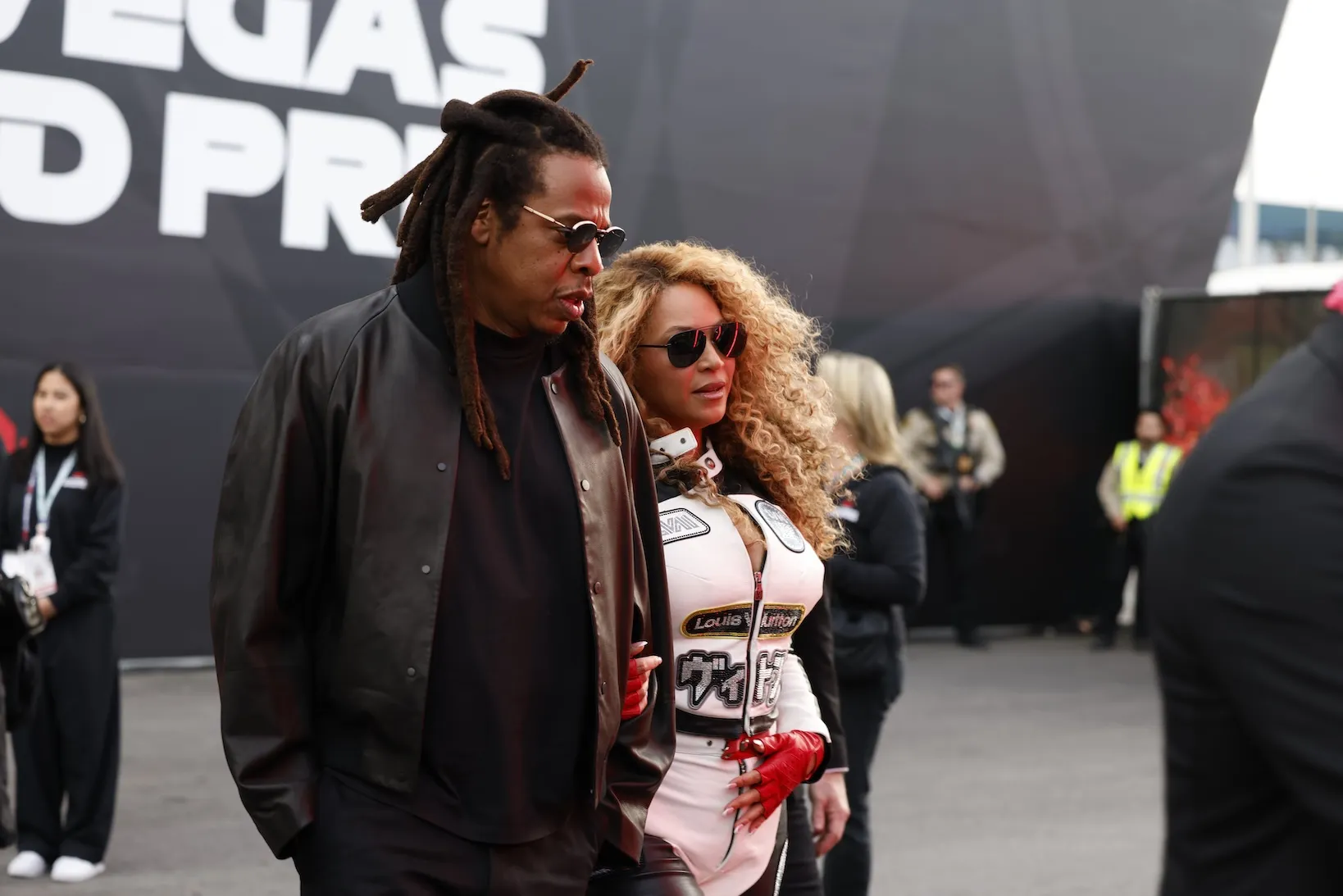 Jay-Z and Beyoncé at the F1 Las Vegas Grand Prix in November 2025. They are walking next to each other.